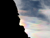 Cloud Iridescence Behind a Canyon Wall