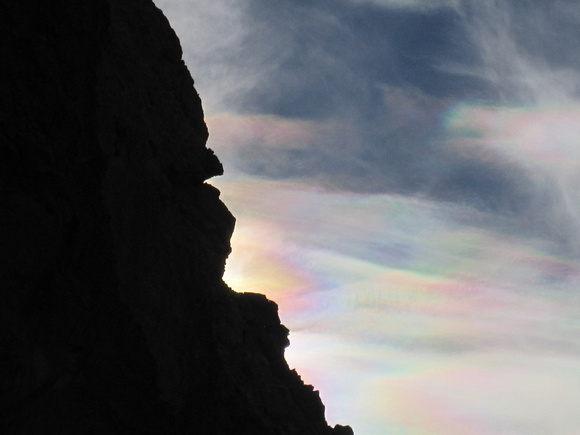 Cloud Iridescence Behind a Canyon Wall